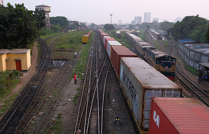 A container train makes its way through Dhaka, the capital of Bangladesh. Photo credit: Shutterstock